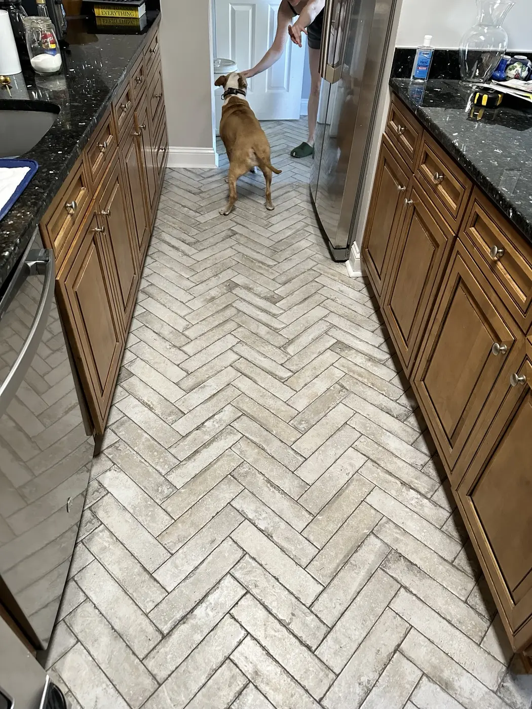 Herringbone tile kitchen floor
