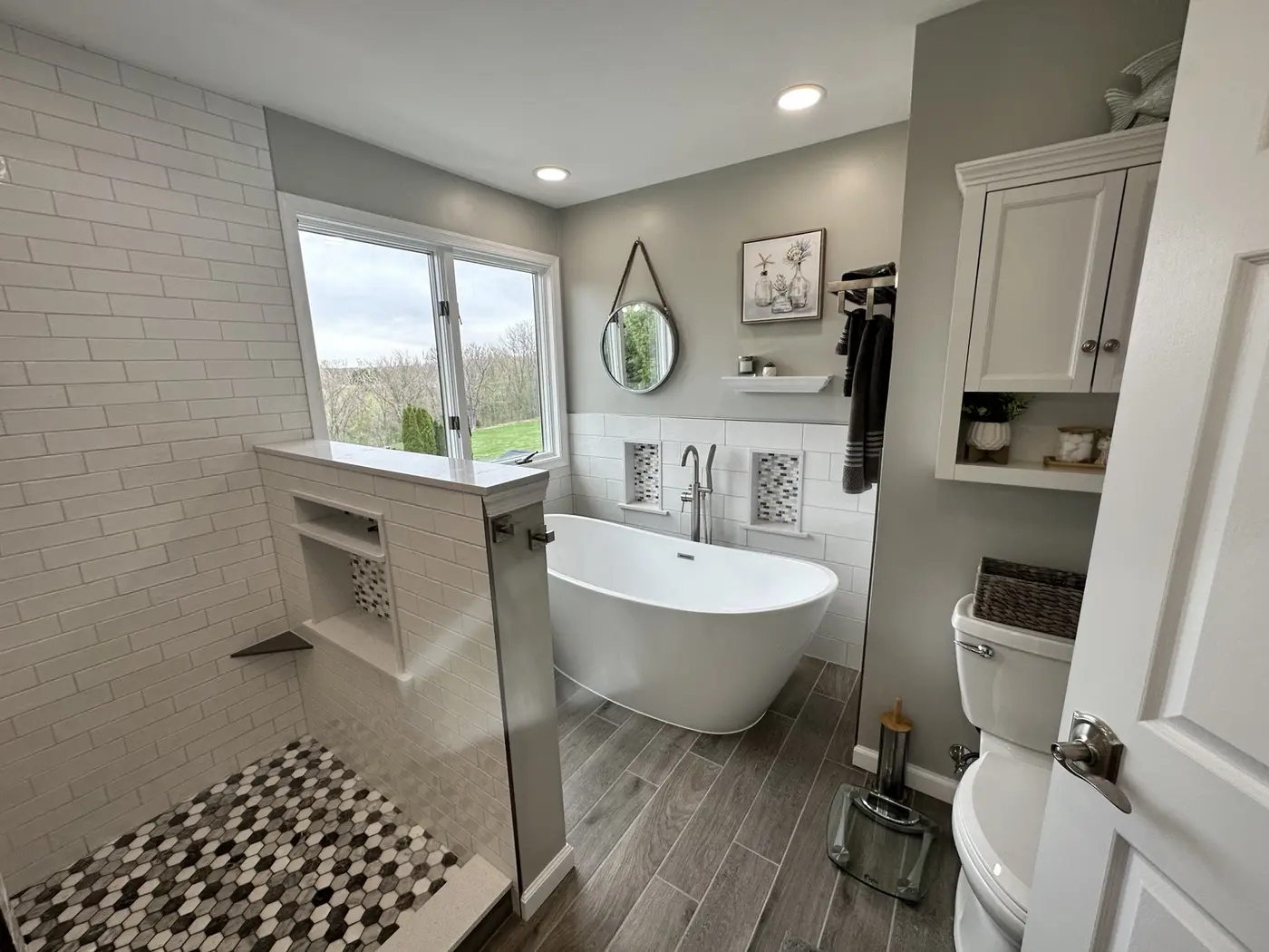 Bathroom with freestanding tub and open shower