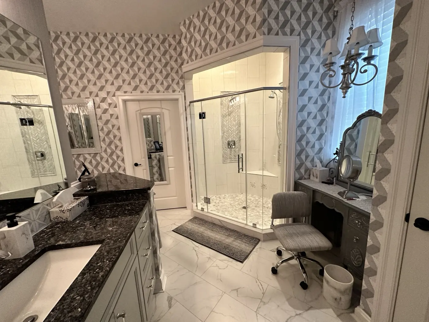 Glass enclosed custom tiled shower
